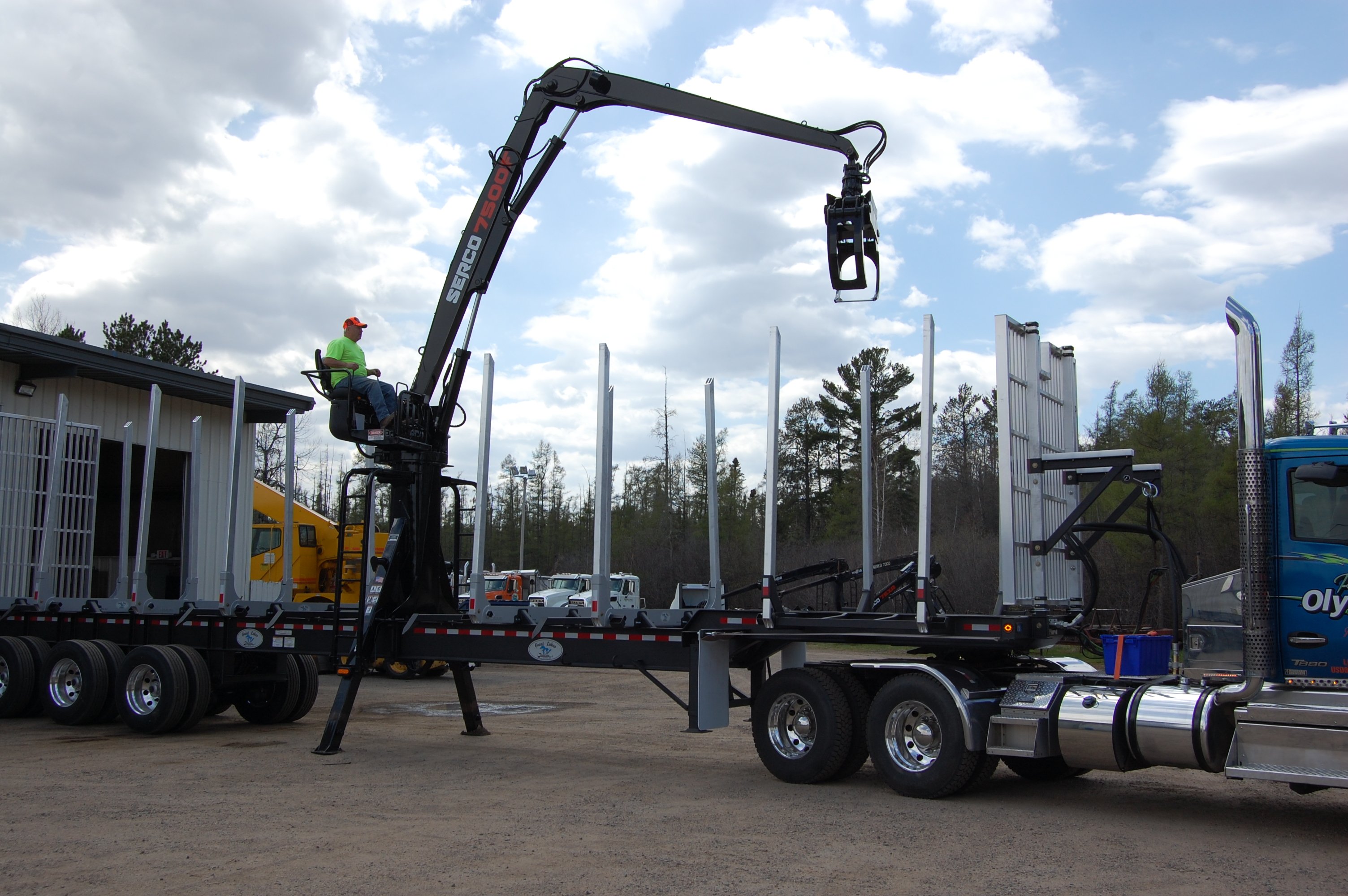 Serco 7500F on a Great Lakes Log Trailer 2